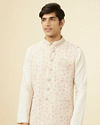 alt message - Manyavar Men Cream Jacket With Contrasting Pink Motifs image number 0