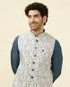 alt message - Manyavar Men Light Cream Printed Jacket image number 0