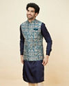 alt message - Manyavar Men Ferozi Blue Botanical Patterned Jacket image number 0