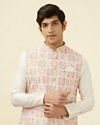 alt message - Manyavar Men Soft Pink Moroccan Printed Jacket image number 0