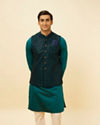 alt message - Manyavar Men Teal Blue Sequined Embroidered Jacket image number 0