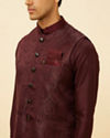 alt message - Manyavar Men Windsor WIne Shankh Patterned Stone Work Jacket image number 1