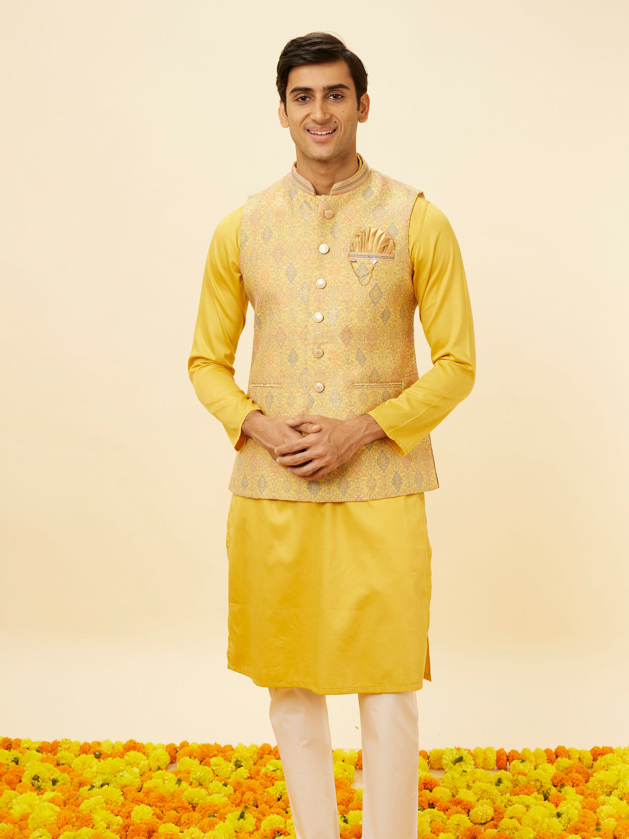 alt message - Manyavar Men Marigold Yellow Shankh Motif Jacket image number 0