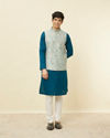 alt message - Manyavar Men Delicate Blue Shankh Patterned Jacket image number 2