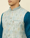 alt message - Manyavar Men Delicate Blue Shankh Patterned Jacket image number 1