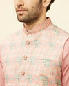 alt message - Manyavar Men Sherbet Pink Kaleidoscopic Printed Sequined Jacket image number 1