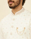 alt message - Manyavar Men Warm White Floral Printed Nehru Jacket image number 1