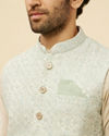 alt message - Manyavar Men Warm White Imperial Printed Sequined Jacket image number 1