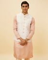 alt message - Manyavar Men Blush Pink Chevron Patterned Jacket image number 0