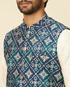 alt message - Manyavar Men Teal Blue Grid Patterned Jacket image number 1