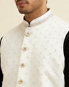 alt message - Manyavar Men Elegant White Nehru Jacket with Hand Embroidery and Cutdana Work image number 1