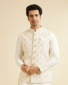 alt message - Manyavar Men Warm White Ogee Jaal Patterned Nehru Jacket image number 0