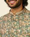 alt message - Manyavar Men Teal Green Floral Printed Nehru Jacket image number 1