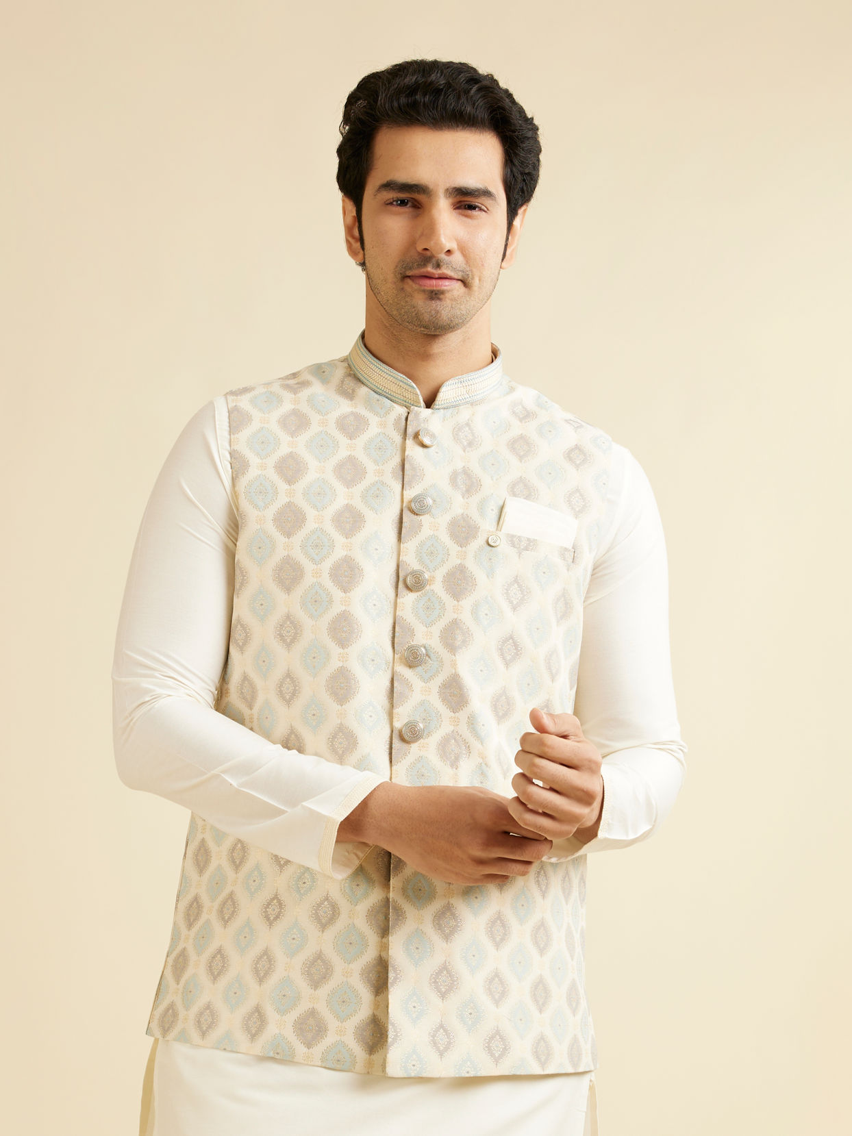 alt message - Manyavar Men Light Cream Conch Shell Motifs Nehru Jacket image number 0