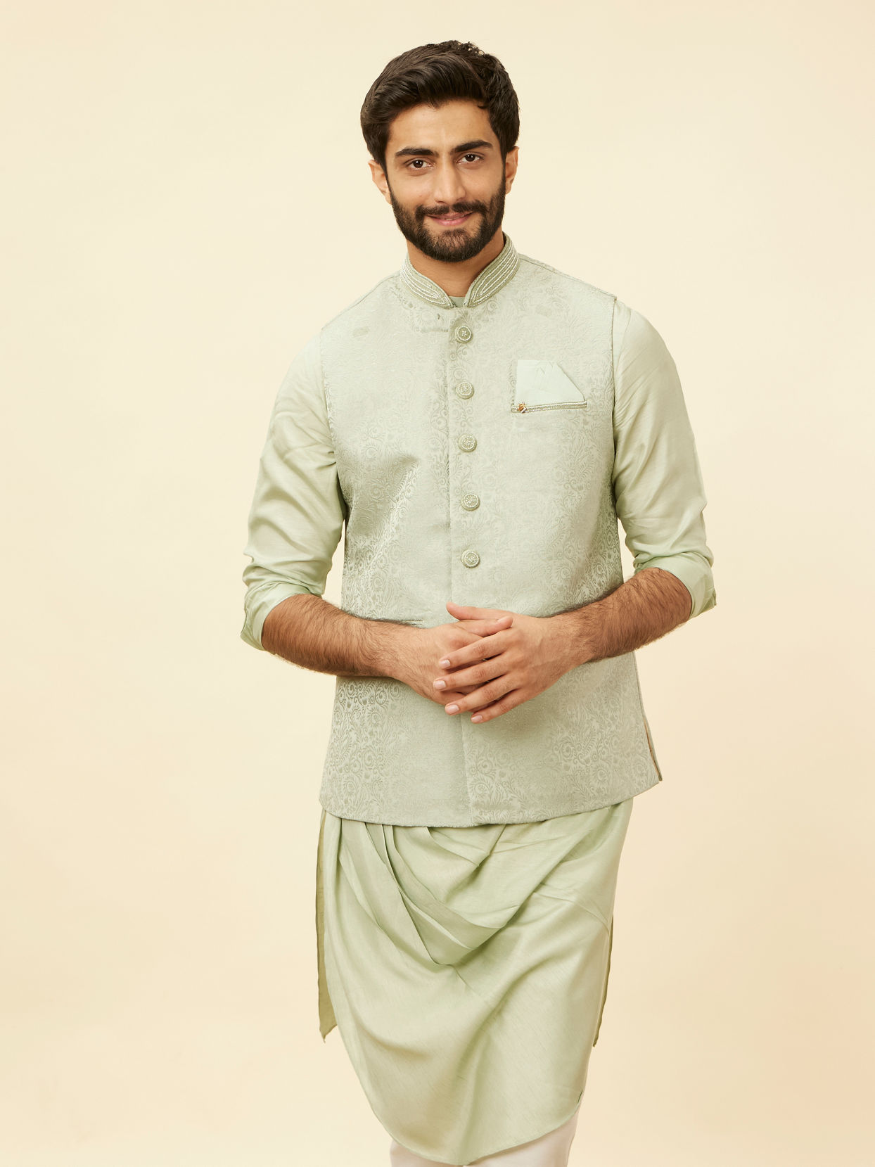 alt message - Manyavar Men Tea Green Bel Buti Patterned Drape Detailed Kurta Jacket Set image number 0