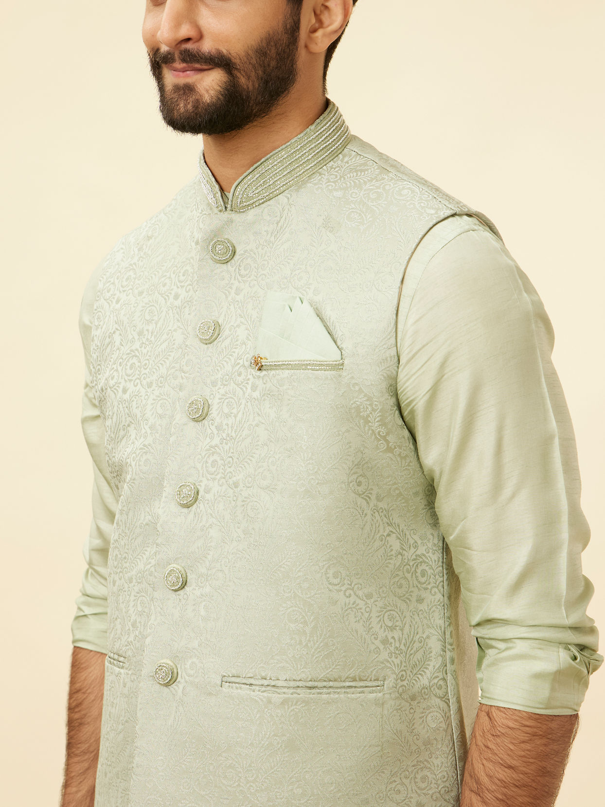 alt message - Manyavar Men Tea Green Bel Buti Patterned Drape Detailed Kurta Jacket Set image number 1