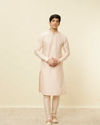Manyavar Men Peach Pink Geometric Wave Patterned Jacket Set