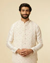 alt message - Manyavar Men Warm White Medallion Printed Jacket set image number 0