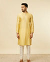 alt message - Manyavar Men Yellow Grid Patterned Chowkadi Motif Jacket Set image number 2