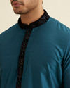 alt message - Manyavar Men Dark Blue & Teal Blue Sequined Jacket Set image number 1