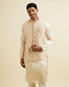 alt message - Manyavar Men Cream Beige Self Patterned Jacket Set image number 0