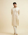 alt message - Manyavar Men Cream Beige Self Patterned Jacket Set image number 3