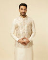 alt message - Manyavar Men Cream Floral Printed Jacket Set image number 0