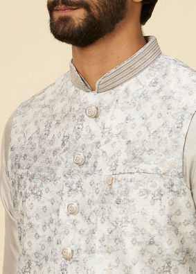 alt message - Manyavar Men Light Grey Bel Buti Patterned Jacket Set image number 1