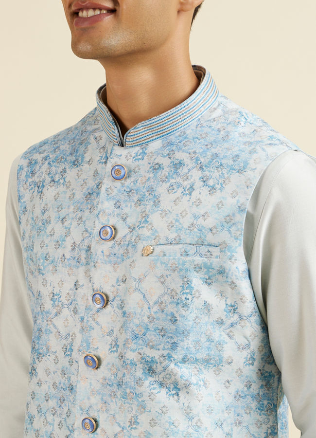 alt message - Manyavar Men Light Blue Kurta Jacket Set with Foil Print and Zari Embroidery image number 1