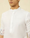 Manyavar Men Bright White Floral Patterned Jacket Set