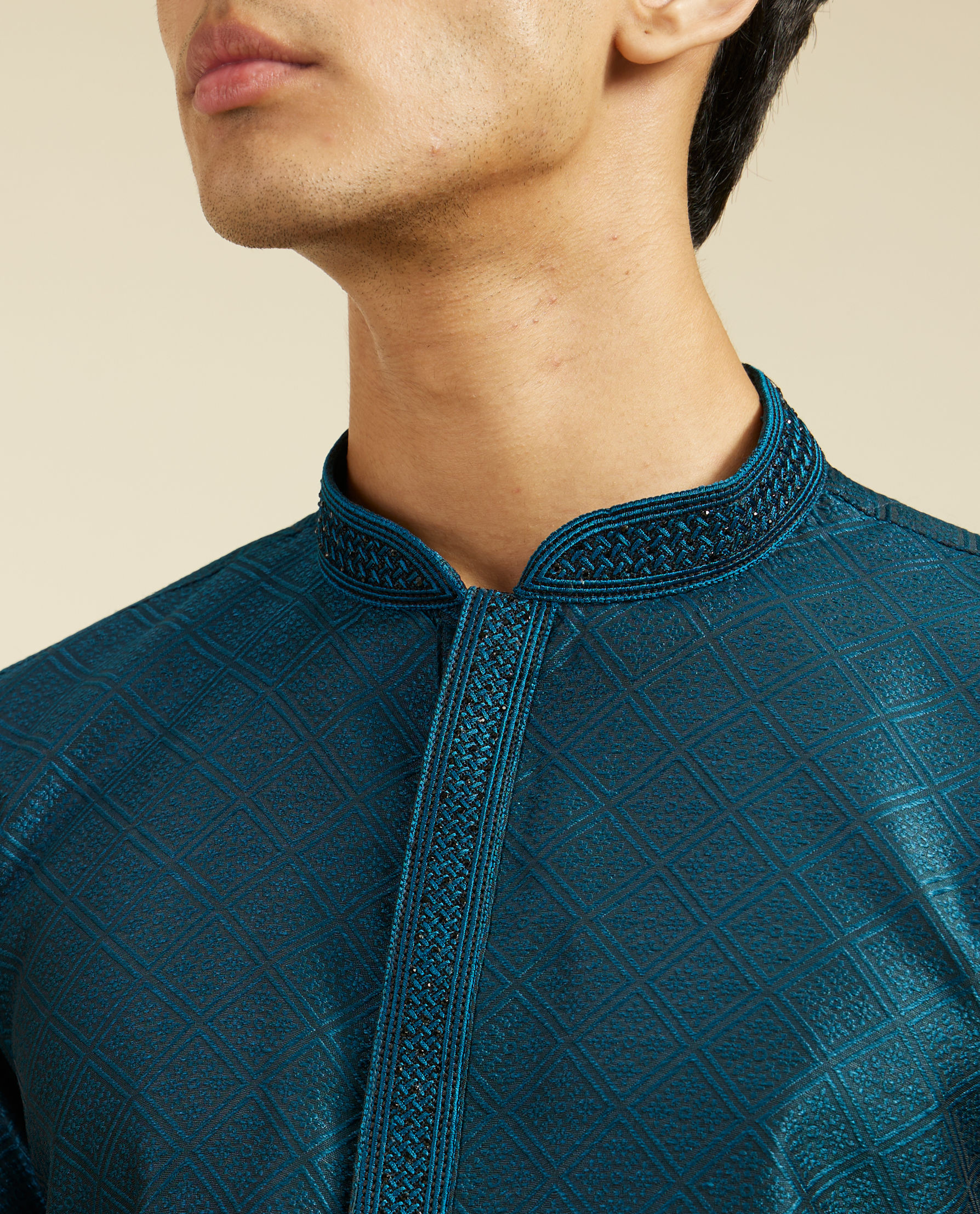 alt message - Diwas Men Teal Blue Grid Kurta with Embroidered Neckline image number 1