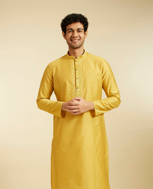 alt message - Diwas Men Mustard Yellow Plain Classic Kurta with Embroidered Neckline image number 0