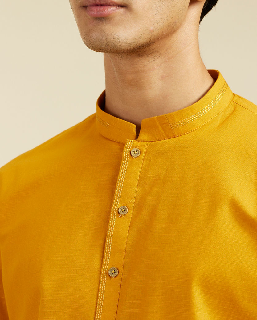 alt message - Diwas Men Mustard Yellow Plain Kurta with Embroidered Neck image number 1