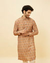 alt message - Manyavar Men Rust Batik Inspired Printed Kurta Set image number 0