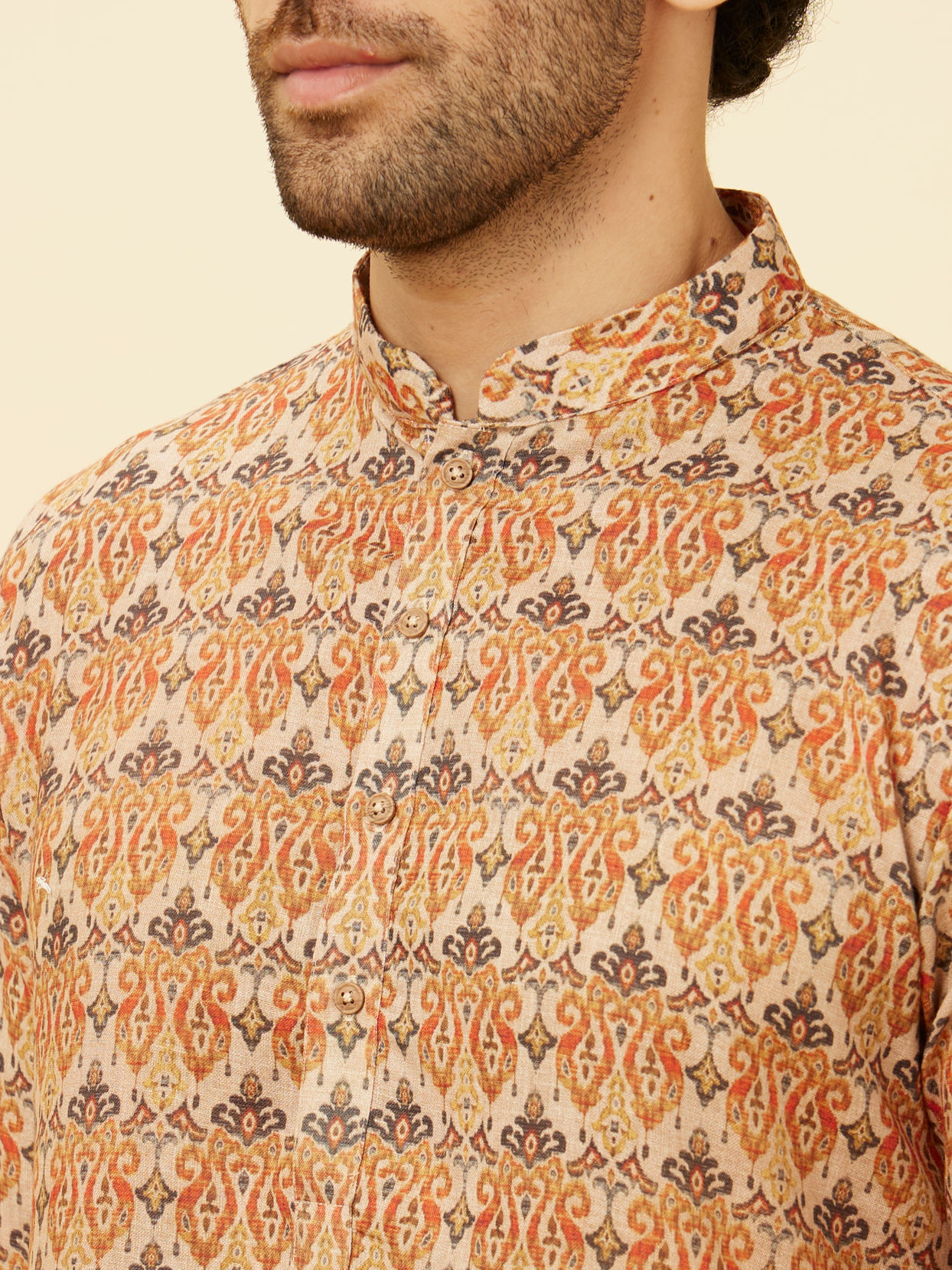 alt message - Manyavar Men Rust Batik Inspired Printed Kurta Set image number 1