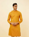 alt message - Manyavar Men Mustard Yellow Angrakha Style Kurta Set image number 0