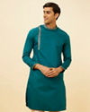 alt message - Manyavar Men Teal Green Angrakha Kurta Set image number 0