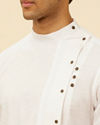 alt message - Manyavar Men Pristine White Angrakha Kurta Set image number 1