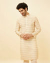 alt message - Manyavar Men Peach Beige Harlequin Printed Kurta Set image number 0