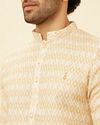 alt message - Manyavar Men Peach Beige Harlequin Printed Kurta Set image number 1