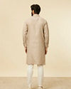 alt message - Manyavar Men Solid Walnut Self Striped Patterned Kurta image number 4