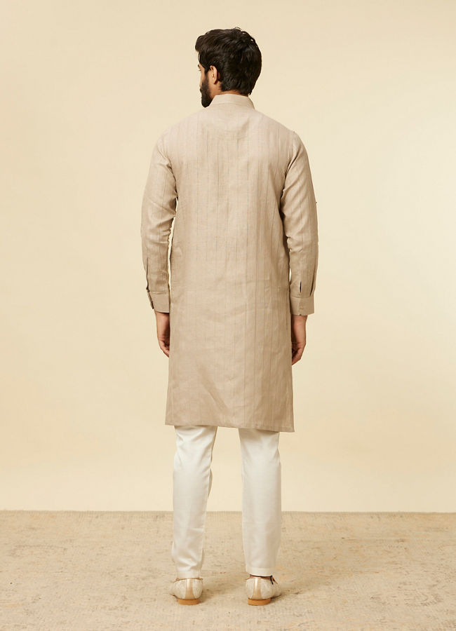 alt message - Manyavar Men Solid Walnut Self Striped Patterned Kurta image number 4