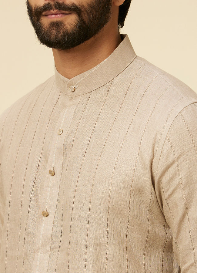 alt message - Manyavar Men Solid Walnut Self Striped Patterned Kurta image number 1