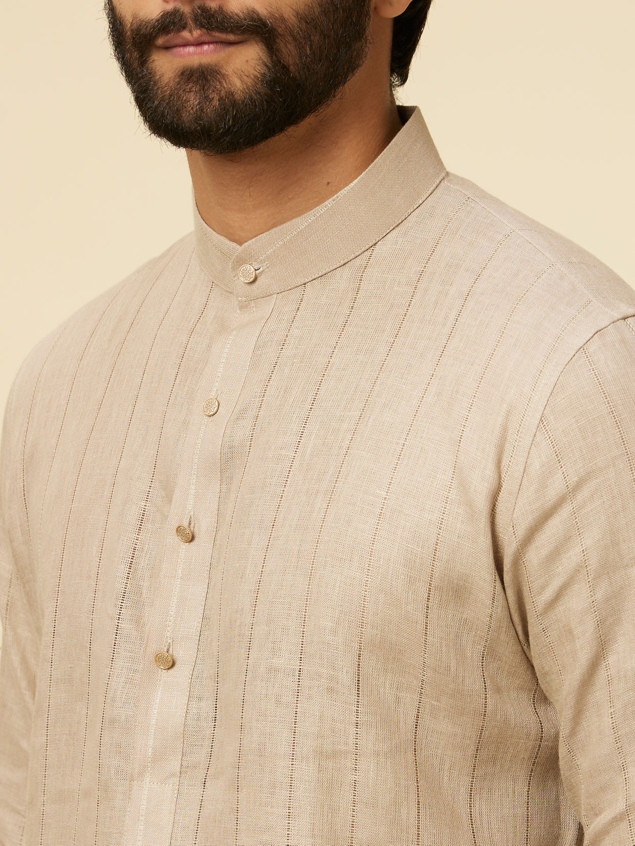 alt message - Manyavar Men Solid Walnut Self Striped Patterned Kurta image number 1