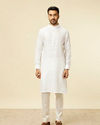 alt message - Manyavar Men Classic White Self Striped Patterned Kurta image number 2