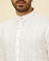 alt message - Manyavar Men Classic White Self Striped Patterned Kurta image number 1