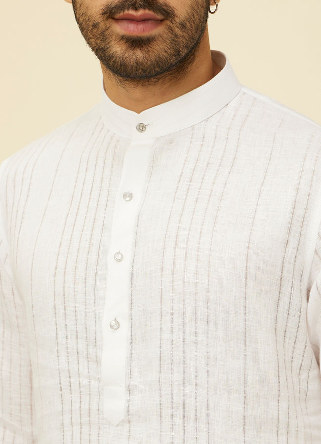 alt message - Manyavar Men Classic White Self Striped Patterned Kurta image number 1