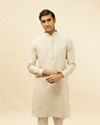 alt message - Manyavar Men Natural Beige Embroidered Neckline Kurta image number 0