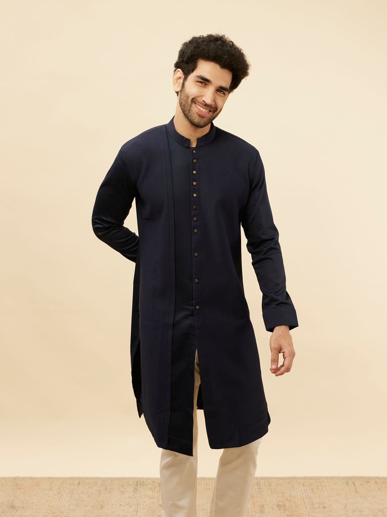 alt message - Manyavar Men Navy Blue Textured Kurta image number 0