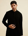 alt message - Manyavar Men Black Striped Patterned Kurta image number 0